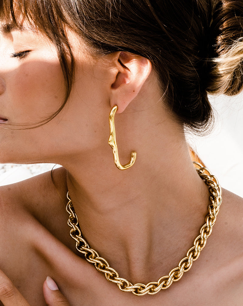 Brunette woman wearing Heritage Earring and Chain Necklace