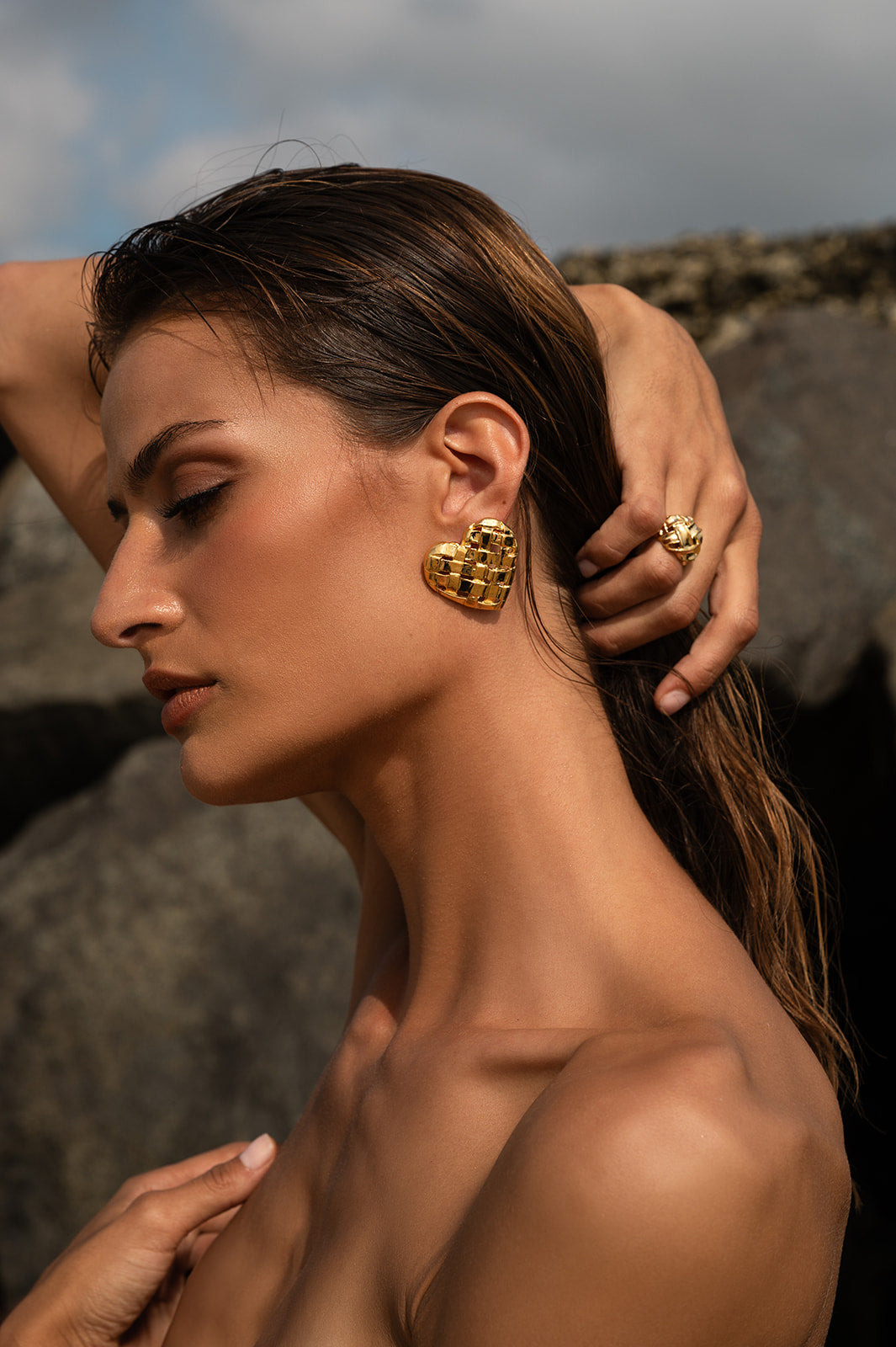 Model wearing Woven Heart Earring