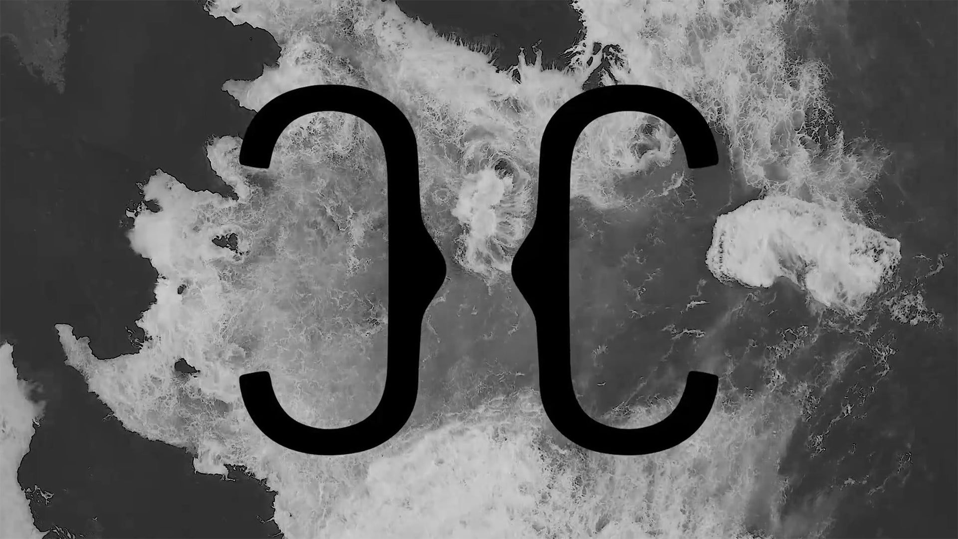 Black Christina Caruso logo on ocean background - still from video