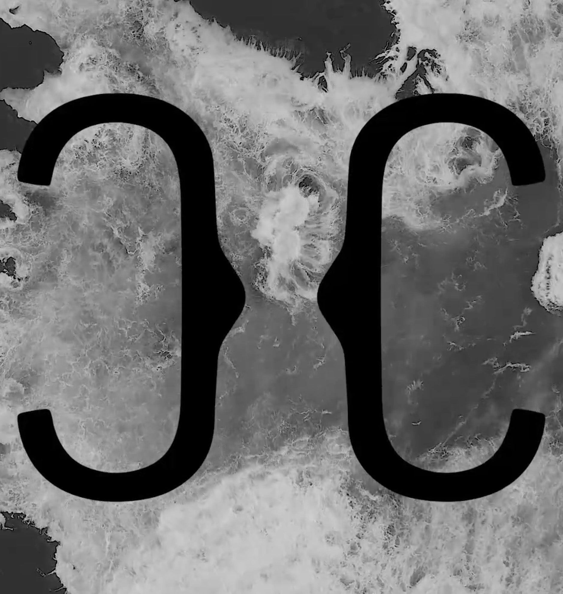 Black Christina Caruso logo on ocean background - still from video