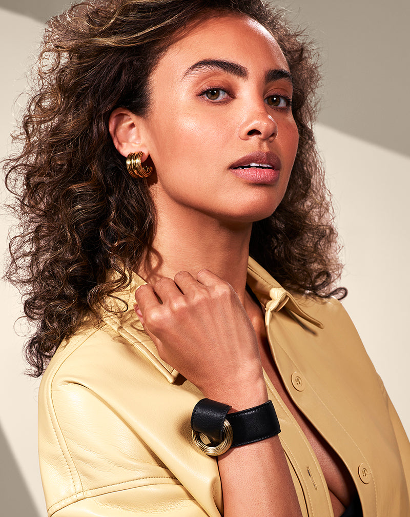 Woman wearing Baby Triple Hoop Earrings